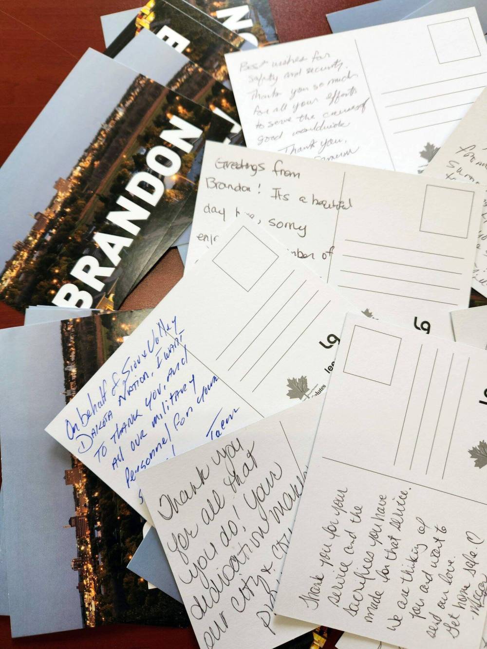A group of postcards is set for soldiers in May who had been deployed overseas from CFB Shilo. The service of “morale mail,” sending wishes from home, typically relied on Canada Post until the postal strike this fall. Organizers at CFB Shilo have had to find alternative solutions to get the postcards overseas. (Brandon Salutes/Facebook)