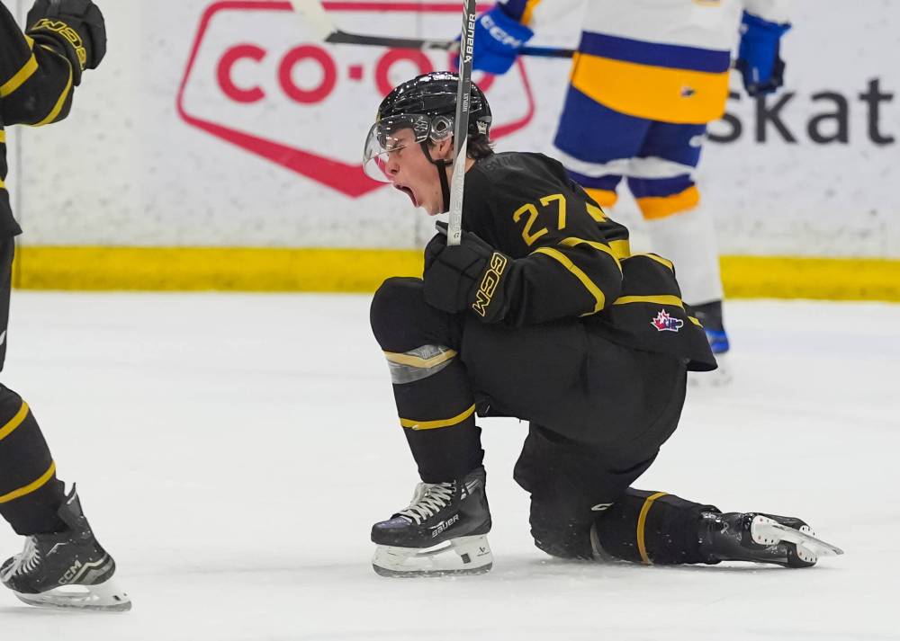 Brandon Wheat Kings overage defenceman Luke Shipley celebrates his winning goal against the Saskatoon Blades in Western Hockey League action at SaskTel Centre on Sunday as the Wheat Kings earned a 4-2 victory. (Steve Hiscock/Saskatoon Blades)