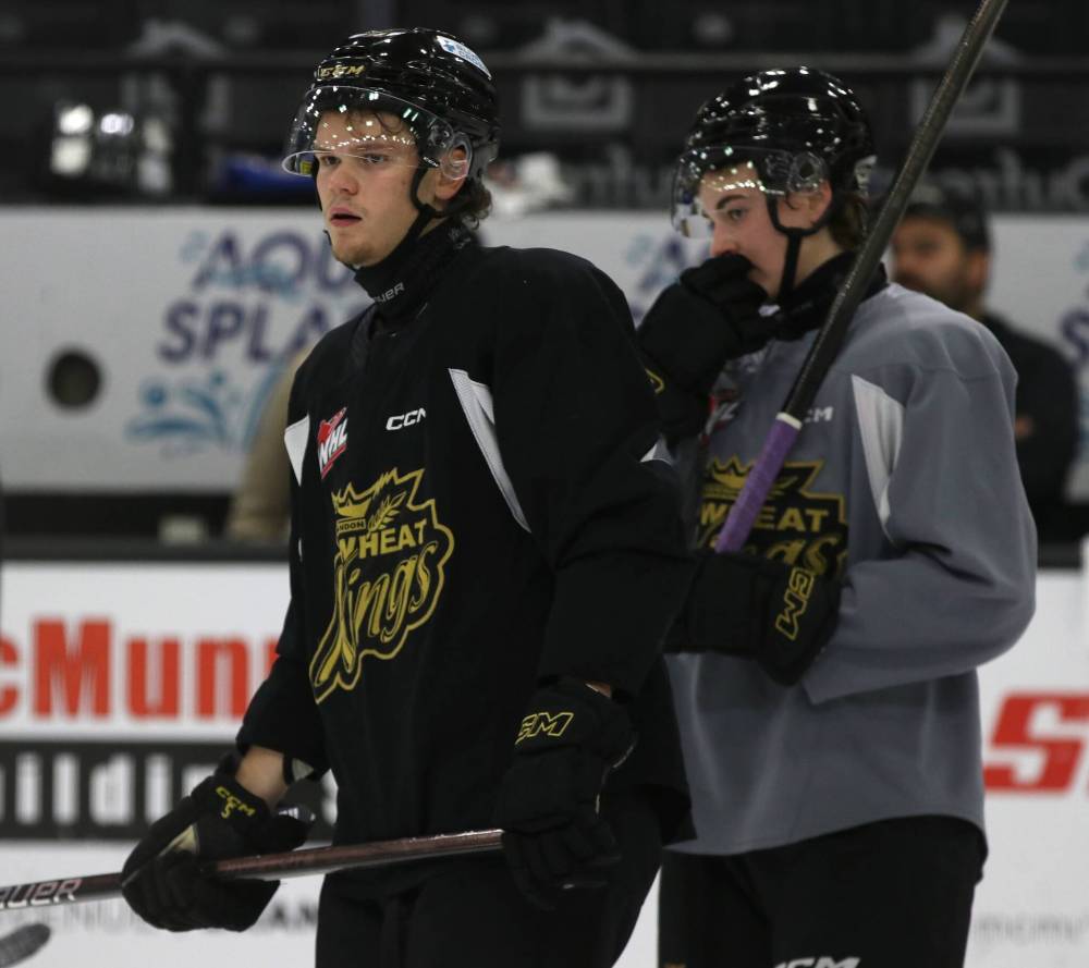 Brandon Wheat Kings defenceman Rhett Ravndahl, in black, will spend time snowmobiling with his brothers near Birch Hills, Sask., and will be on the lookout for the perfect Christmas tree. (Perry Bergson/The Brandon Sun)