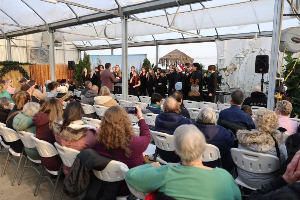 The Crocus Plains Regional Secondary School Music Choir performs one of their songs at The Green Spot on Saturday. (Abiola Odutola/The Brandon Sun)