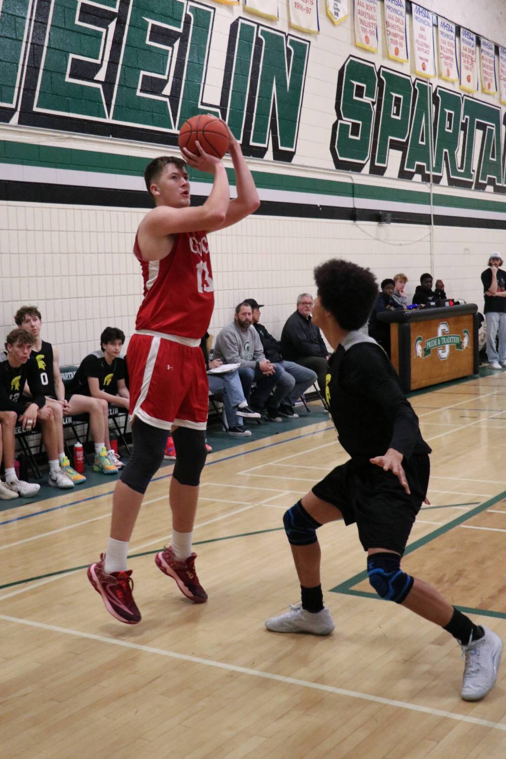 Source for Sports division tournament MVP Ethan Wiebe of Garden Valley takes a shot over Neelin's Kwali Taylor in the final. (Matt Packwood/The Brandon Sun)