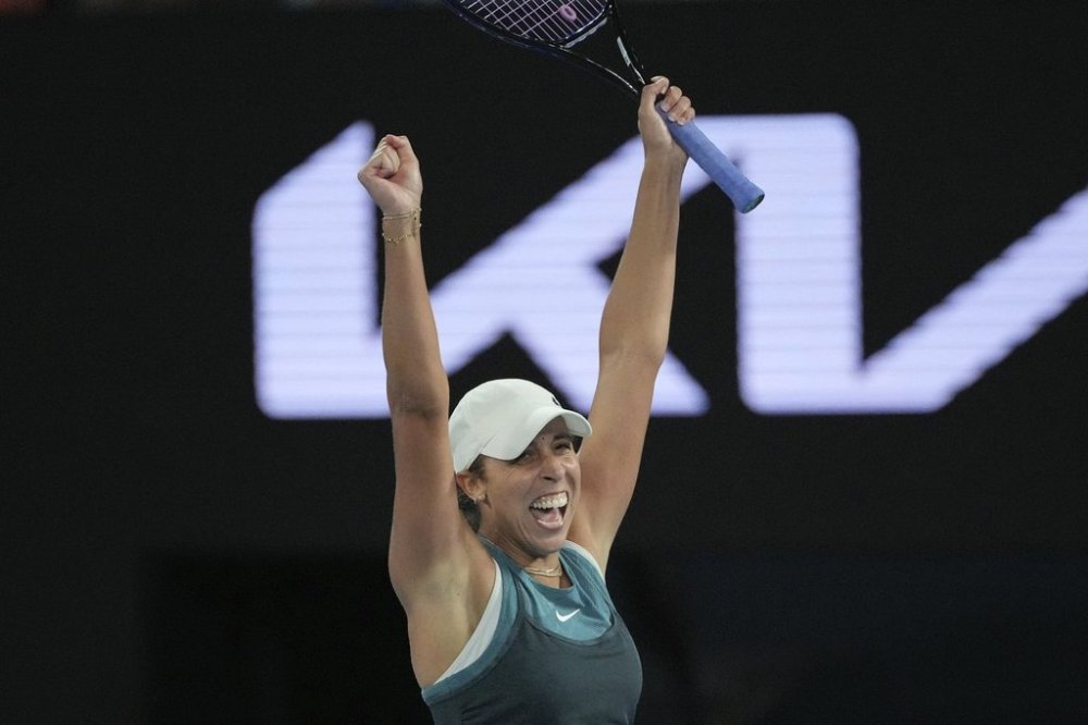 Madison Keys of the U.S. celebrates after defeating Aryna Sabalenka of Belarus during the women's singles final at the Australian Open tennis championship in Melbourne, Australia, Saturday, Jan. 25, 2025. (AP Photo/Vincent Thian)