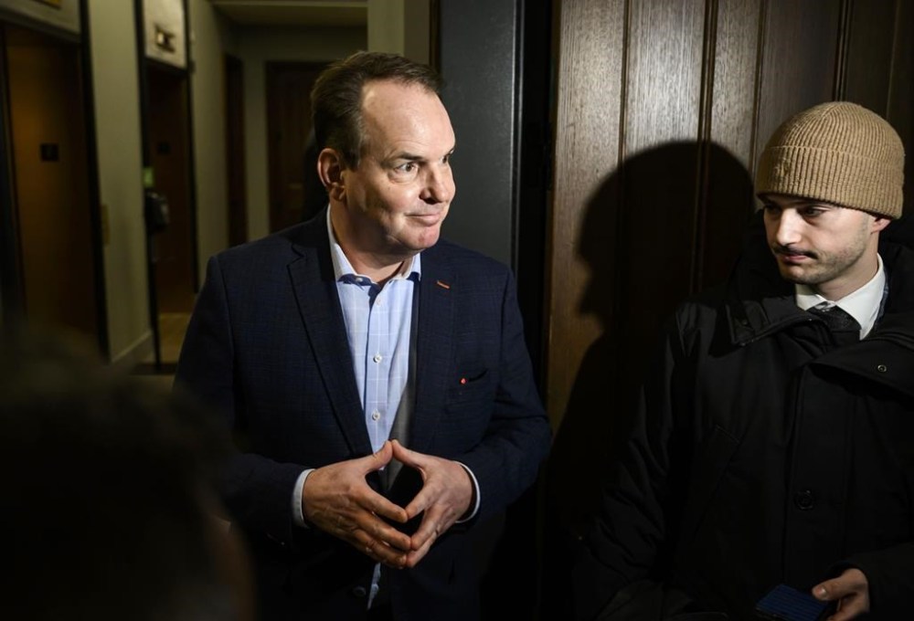 Labour Minister Steven MacKinnon says he won't join the race to become the next leader of the Liberal party. MacKinnon speaks with journalists on his way to a Liberal Party caucus meeting in West Block on Parliament Hill in Ottawa on Wednesday, Jan. 8, 2025. THE CANADIAN PRESS/Justin Tang
