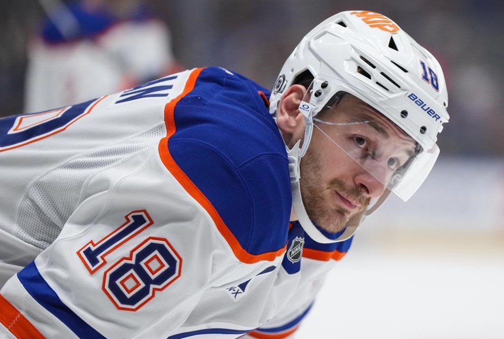 A group led by Edmonton Oilers forward Zach Hyman and his family have purchased the Ontario Hockey League's Brantford Bulldogs. Hyman waits for a faceoff during the first period of an NHL hockey game against the Vancouver Canucks, in Vancouver, on Saturday, November 9, 2024. THE CANADIAN PRESS/Darryl Dyck
