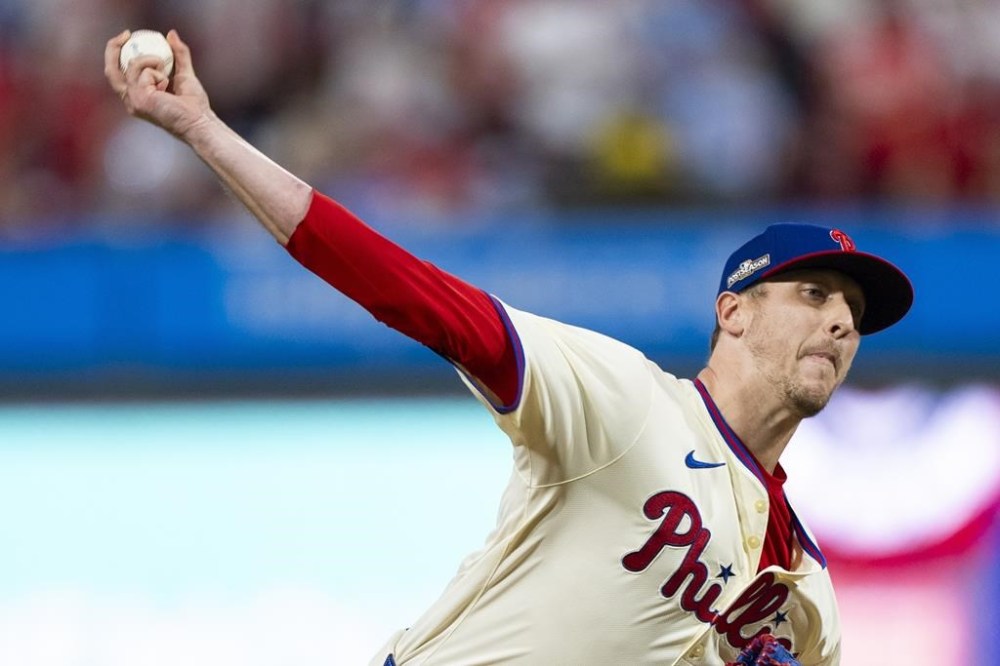Phillies reliever Jeff Hoffman delivers a pitch during Game 2 of a baseball NL Division Series against the New York Mets, Oct. 6, 2024, in Philadelphia. Hoffman held a media availability Wednesday after agreeing to a three-year deal with the Toronto Blue Jays. THE CANADIAN PRESS/AP/Chris Szagola