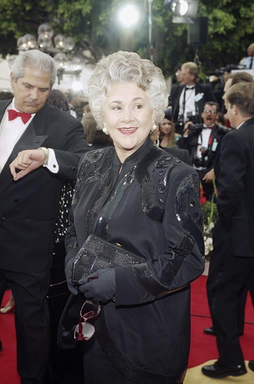 FILE - Joan Plowright, nominated for best supporting actress for her role in 'Enchanted April' arrives at the Music Center in Los Angeles on Monday, March 29, 1993 for the 65th Annual Academy Awards. (AP Photo/Julie Markes, File)
