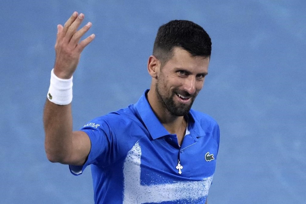 Novak Djokovic of Serbia gestures during a fourth round match against Jiri Lehecka of the Czech Republic at the Australian Open tennis championship in Melbourne, Australia, Sunday, Jan. 19, 2025. (AP Photo/Mark Baker)