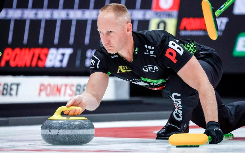 Team Jacobs skip Brad Jacobs delivers a stone during curling action against Team Horgan at the PointsBet Invitational in Calgary on Thursday, Sept. 26, 2024. THE CANADIAN PRESS/Jeff McIntosh