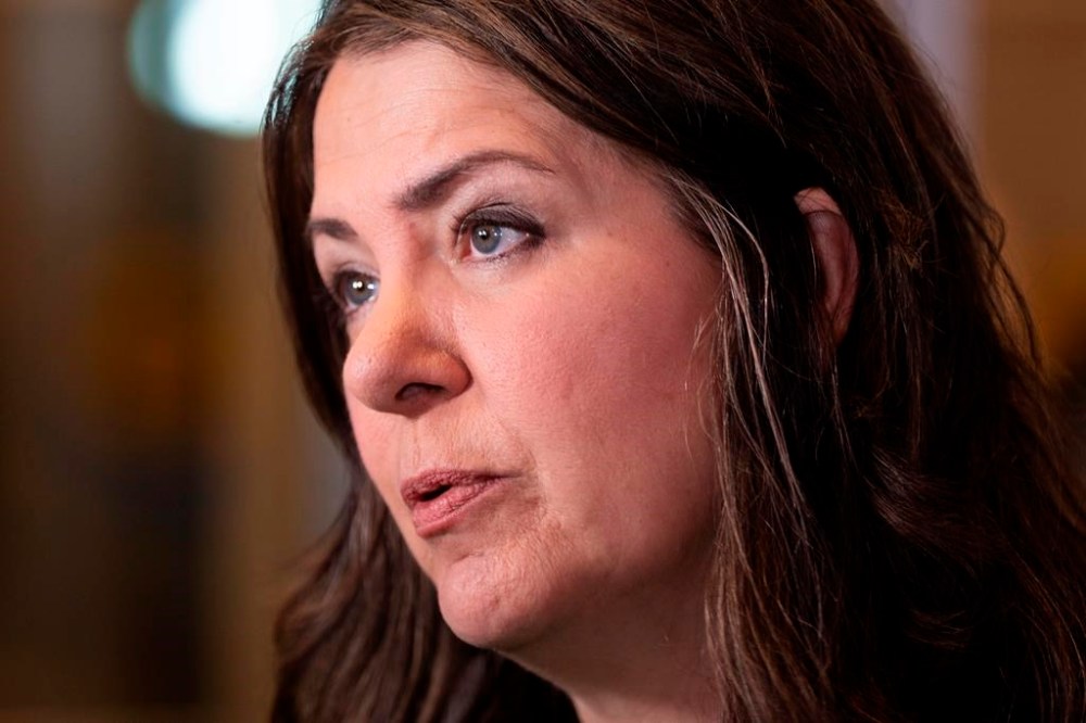 Alberta Premier Danielle Smith speaks with reporters before a meeting in Halifax, Monday, July 15, 2024. THE CANADIAN PRESS/Darren Calabrese