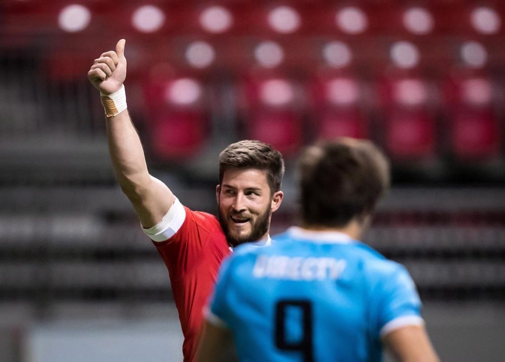 Canada's DTH van der Merwe, back, celebrates after scoring a try as Uruguay's Santiago Arata looks on during the first half of a Rugby World Cup qualifier match in Vancouver on January 27, 2018. DTH van der Merwe, Canada's all-time leading try-scorer, can add Hall of Famer to his resume. THE CANADIAN PRESS/Darryl Dyck