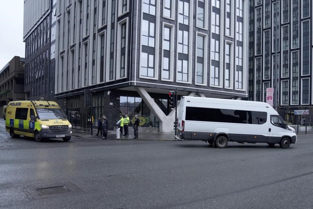 An escorted prison van believed to contain Axel Rudakubana leaves Liverpool Crown Court in Liverpool, England, Monday, Jan. 20, 2025 where Rudakubana is charged with killing three girls and wounding 10 other people in a stabbing rampage at a Taylor Swift-themed dance class in England last summer.(AP Photo/Jon Super)
