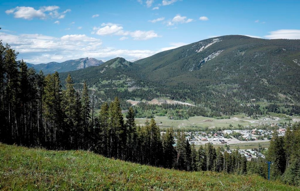 Grassy Mountain, peak to left, and the Grassy Mountain Coal Project are seen north of Blairmore, Alta., Thursday, June 6, 2024. THE CANADIAN PRESS/Jeff McIntosh