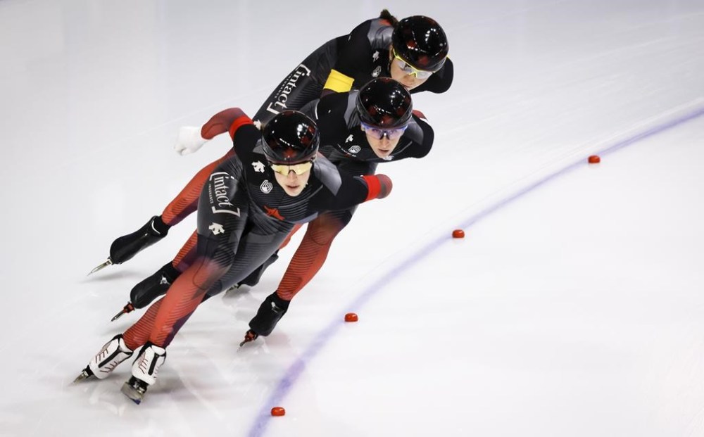 Canada's Valerie Maltais, left, leads teammates Ivanie Blondin, centre, and Isabelle Weidemann during the women's team pursuit competition at the ISU World Cup speedskating event in Calgary, Alta., Saturday, Dec. 10, 2022. THE CANADIAN PRESS/Jeff McIntosh