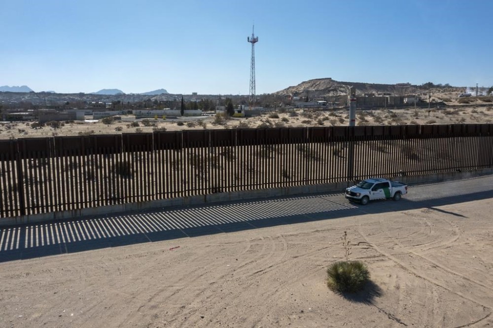 A Border Patrol truck rides along the border wall in Sunland Park, N.M., Tuesday, Jan. 21, 2025. (AP Photo/Andres Leighton)
