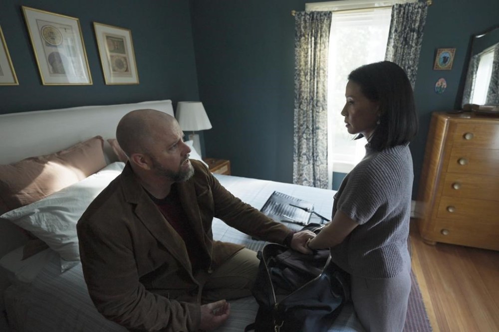 This image released by Neon shows Chris Sullivan, left, and Lucy Liu in a scene from