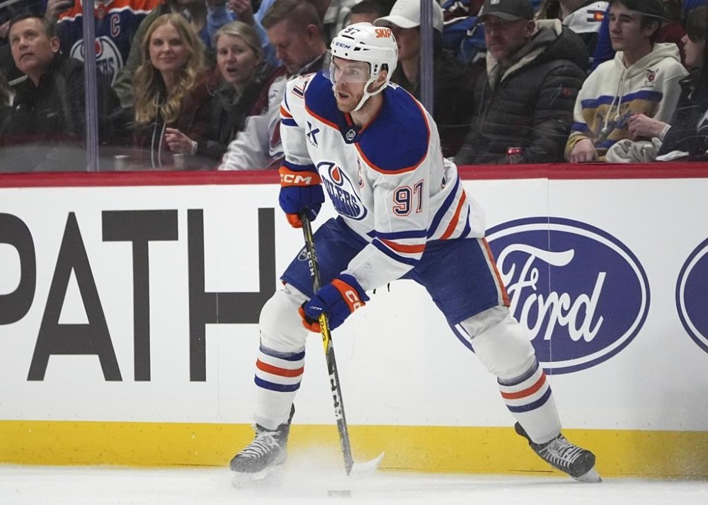 Edmonton Oilers center Connor McDavid (97) in the first period of an NHL hockey game Thursday, Jan. 16, 2025, in Denver. (AP Photo/David Zalubowski)