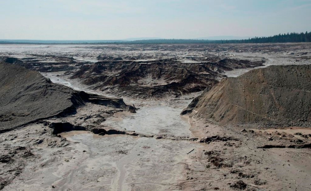 An aerial view shows the damage caused by a tailings pond breach near the town of Likely, B.C., Tuesday, Aug. 5, 2014. THE CANADIAN PRESS/Jonathan Hayward