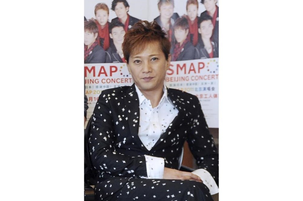 FILE - This photo released by China's Xinhua News Agency shows Masahiro Nakai, one of Japanese pop group SMAP members, posing for a photo during an exclusive interview with Xinhua in Beijing, Sept. 14, 2011. (Jin Liangkuai/Xinhua via AP, File)