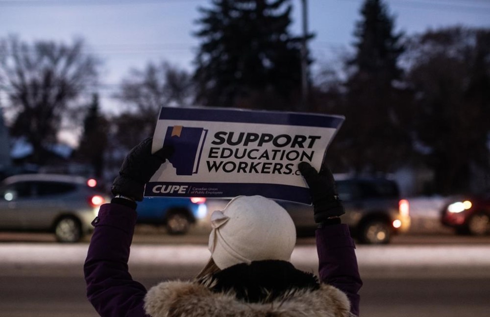 Union members and supporters picket for better education funding, and more classroom support in Edmonton, Monday, Jan. 13, 2025. THE CANADIAN PRESS/Jason Franson