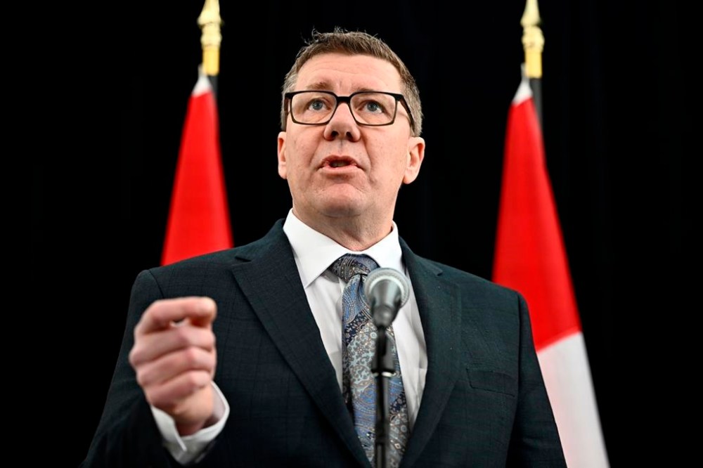 Saskatchewan Premier Scott Moe speaks as he arrives for a first ministers meeting in Ottawa on Wednesday, Jan. 15, 2025. THE CANADIAN PRESS/Justin Tang