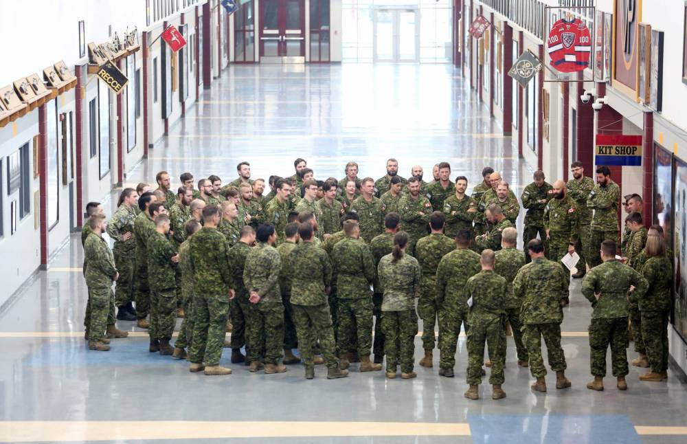 Sgt. Major Tuepah of the 2nd Battalion Princess Patricia’s Canadian Light Infantry takes roll call in the middle of a company of about 75 troops in the 2PPCLI building at CFB Shilo in July. The company was deployed to Alberta to help battle the wildfire situation that destroyed most of the community of Jasper.
