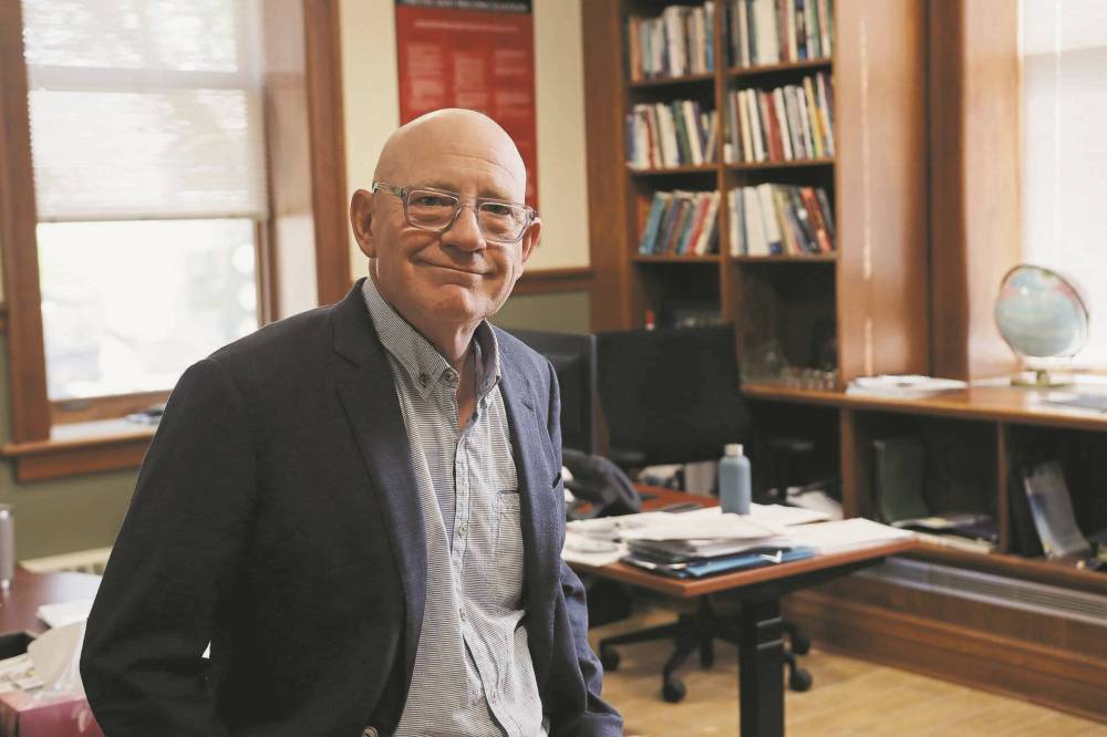 Brandon University president David Docherty is seen in his office on campus. The Brandon Sun, Brandon University and Westman Communications Group will a Brandon-Souris candidates federal election debate on April 23. Docherty says community debates like these are vital. (File)