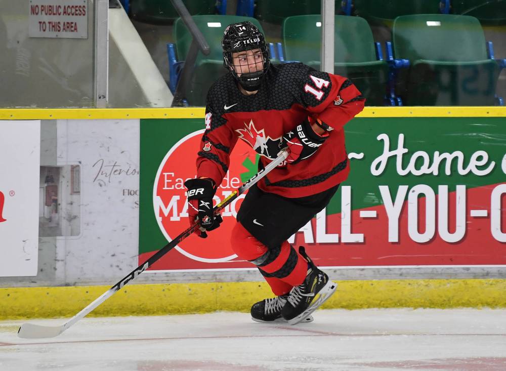 Canada West forward Dru Mushumanski of Rossburn looks for a pass. (Andy Devlin/Hockey Canada Images)