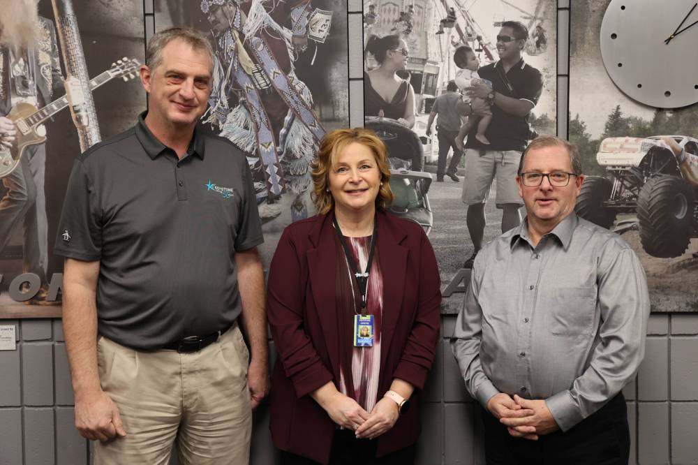 Keystone Centre board chair Bruce Luebke (from left), general manager Connie Lawrence and finance director Dan Robertson pose for a picture in the centre’s boardroom on Thursday morning. (Abiola Odutola/The Brandon Sun)