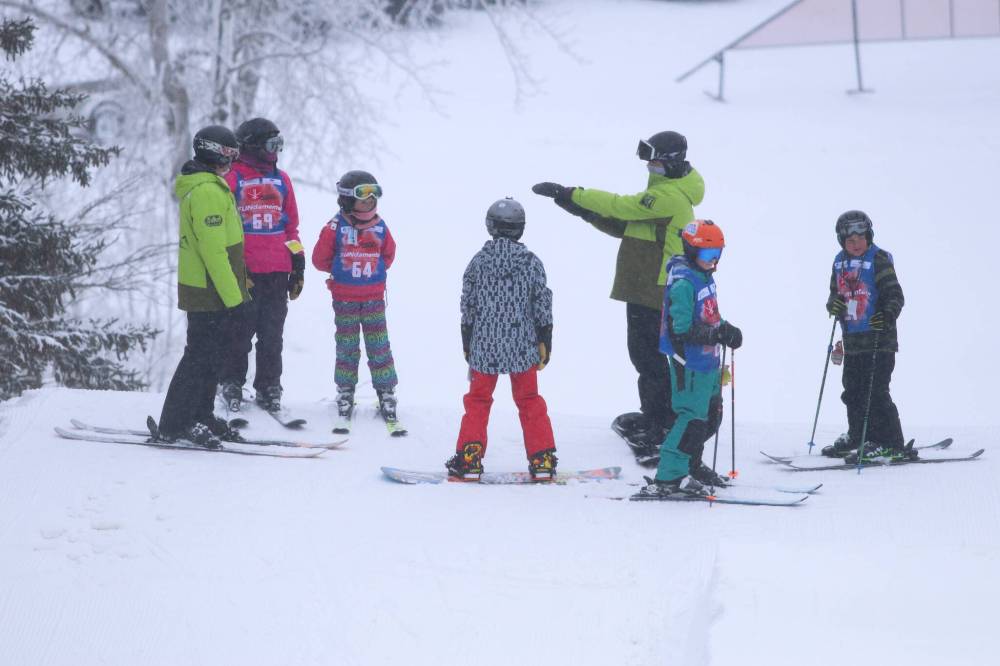 Freestyle FUNdamentalz participants recieve instruction from coach Logan Unger before hitting another round of jumping features at Holiday Mountain. (Matt Packwood/The Brandon Sun)