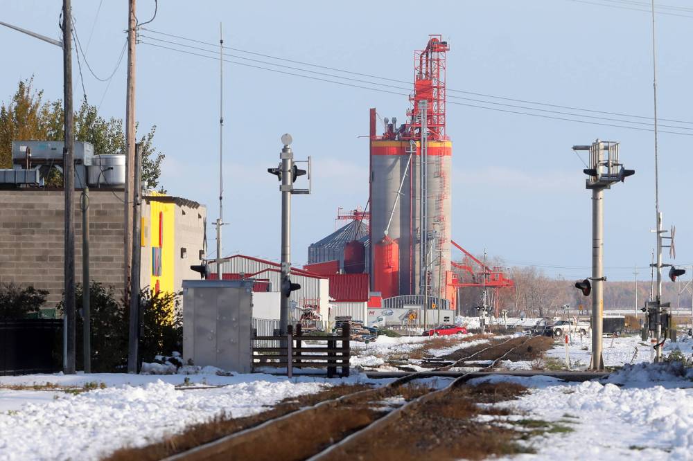 A grain terminal stands next to a rail line in Dauphin. (File)