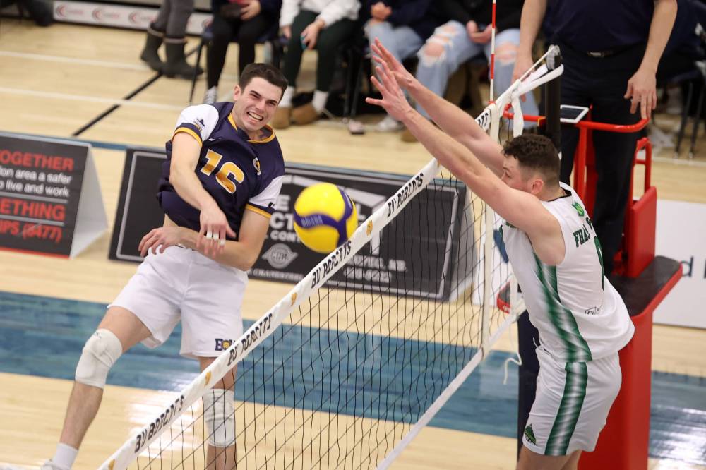 Ryden Hargreaves (16) of the Brandon University Bobcats puts the ball over the net during university volleyball action against the University of Fraser Valley Cascades. (Tim Smith/The Brandon Sun)