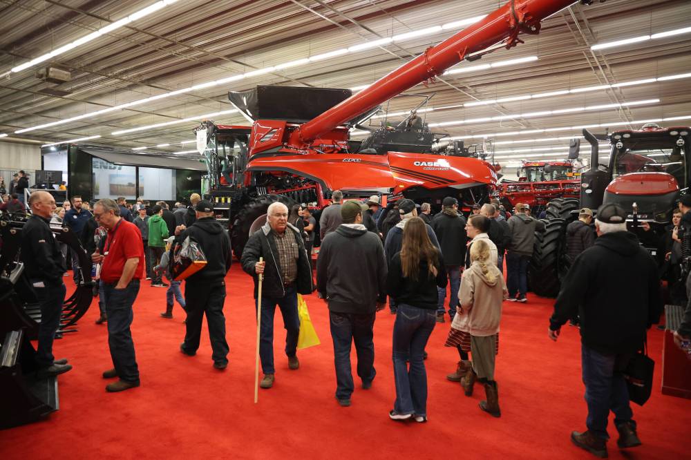 Farmers, producers and other visitors explore all the equipment on display during Manitoba Ag Days at the Keystone Centre on Wednesday. (Tim Smith/The Brandon Sun)