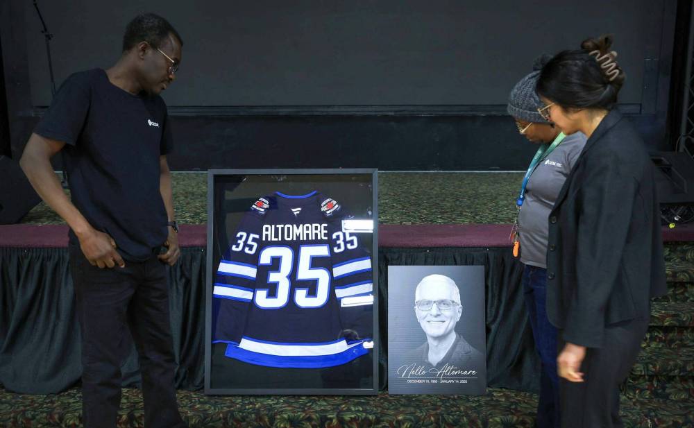 Roughly 1,000 mourners came to the Transcona Country Club for Education Minister Nello Altomare’s public funeral on Wednesday. (Ruth Bonneville/Winnipeg Free Press)