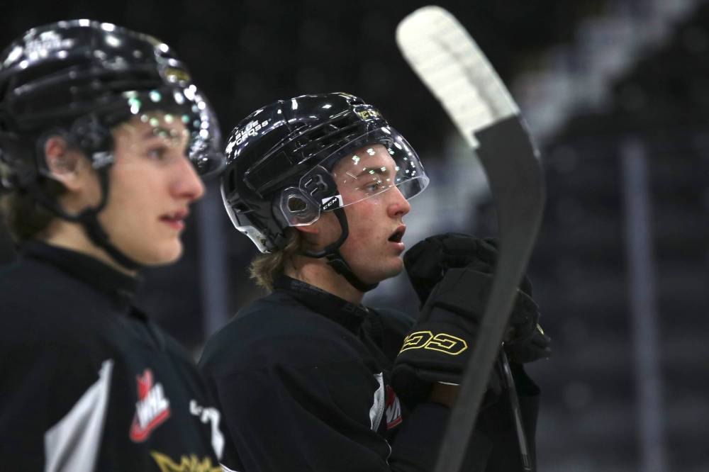 Brandon Wheat Kings captain Quinn Mantei, who is framed by fellow blue-liner Nigel Boehm and his stick, is the reigning player of the week in the Western Hockey League, is seen during practice at Westoba Place on Tuesday afternoon. (Perry Bergson/The Brandon Sun)