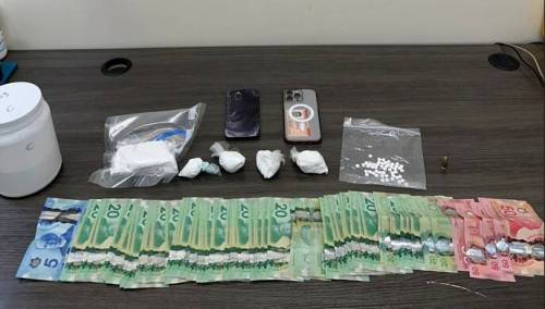 Portage la Prairie RCMP charged three individuals with trafficking cocaine, according to a press release put out by Manitoba RCMP on Tuesday. More than 280 grams of cocaine with an estimated street value of more than $28,000, cash and other drugs, were seized. (Submitted)