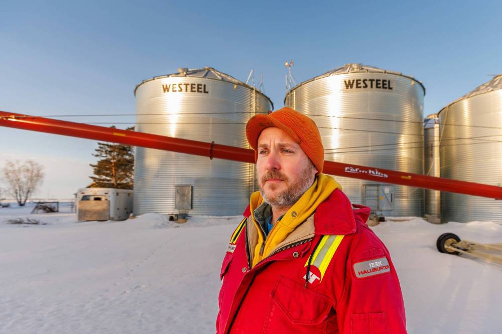 Colin Penner, a grain farmer southwest of Winnipeg, has had to think about the impact of possible tariffs and work on the diversity of his crops. (Mike Deal/Winnipeg Free Press)