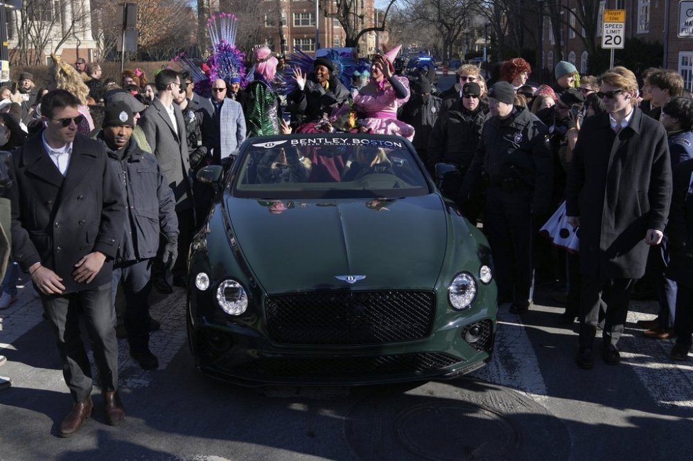 Harvard University's Hasty Pudding Theatricals Woman of the Year Cynthia Erivo rides with two character actors during a parade in her honor, Wednesday, Feb. 5, 2025, in Cambridge, Mass. (AP Photo/Charles Krupa)