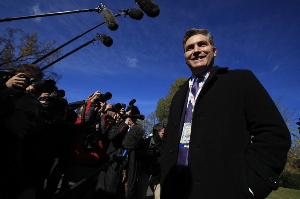 FILE - CNN's Jim Acosta speaks to journalists on the North Lawn upon returning back to the White House in Washington, Friday, Nov. 16, 2018. (AP Photo/Manuel Balce Ceneta, File)