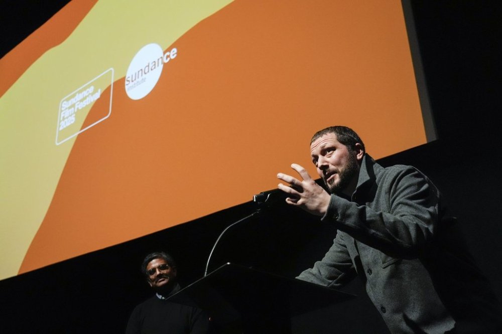 Mstyslav Chernov speaks at the premiere of