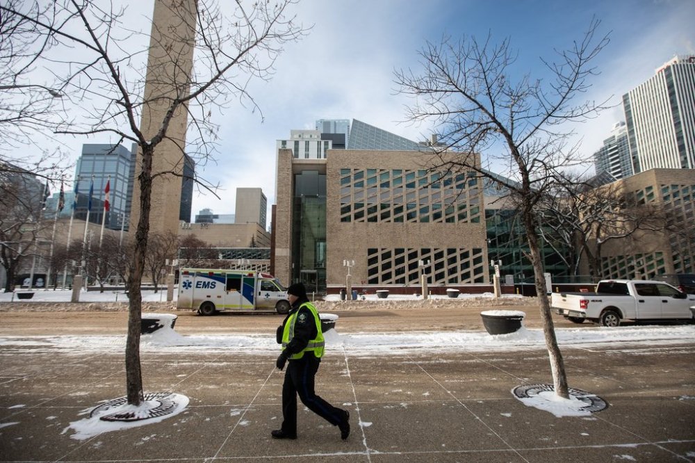 A sheriff patrols City Hall during an investigation in Edmonton, Tuesday, Jan. 23, 2024. THE CANADIAN PRESS/Jason Franson