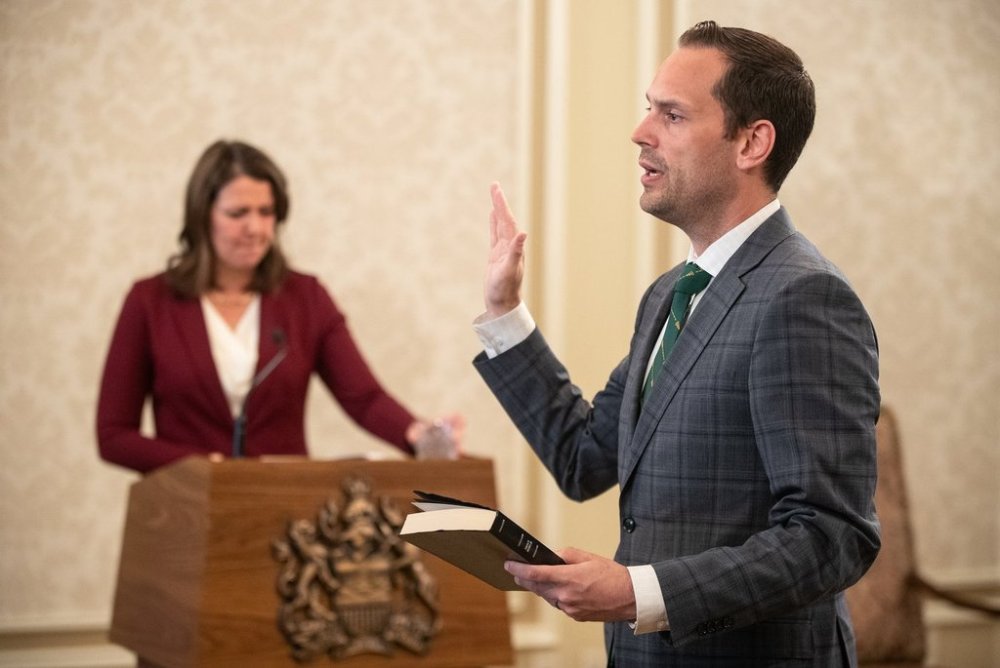 Alberta's government is introducing a new child-care funding formula in an effort to make $15-a-day the flat rate across province. Minister of Jobs, Economy and Trade Matt Jones is sworn into cabinet, in Edmonton, June 9, 2023. THE CANADIAN PRESS/Jason Franson.