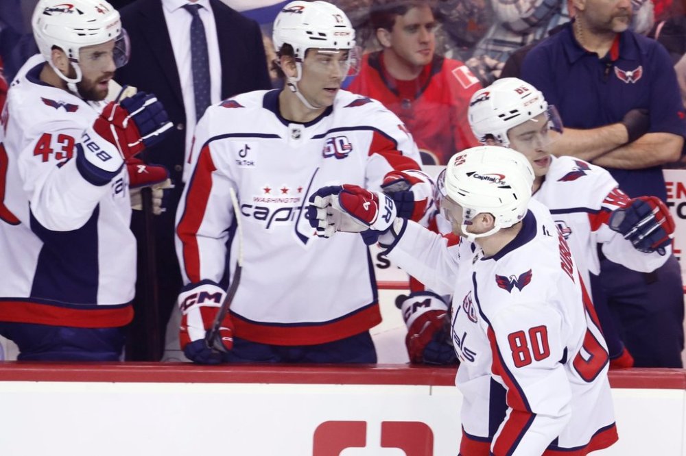 Washington Capitals' Pierre-Luc Dubois celebrates his goal against the Calgary Flames during first period NHL hockey action in Calgary, Tuesday, Jan. 28, 2025. THE CANADIAN PRESS/Larry MacDougal