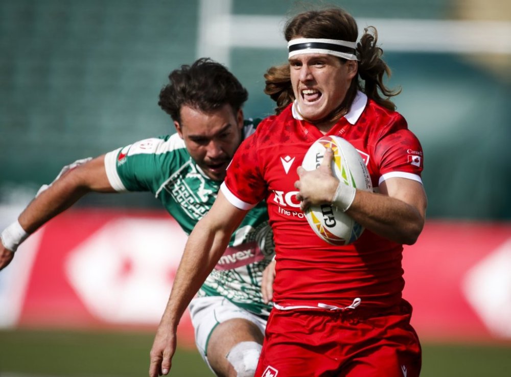 Canada's Thomas Isherwood, right, outruns Mexico's Luc Martin to score a try during HSBC Canada Sevens rugby action in Edmonton, Saturday, Sept. 25, 2021. THE CANADIAN PRESS/Jeff McIntosh