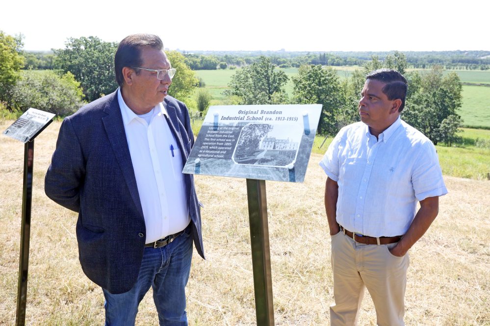 Sioux Valley Dakota Nation Chief Vince Tacan shows Crown-Indigenous Relations Minister Gary Anandasangaree around the site of the former Brandon Indian Residential School just west of Brandon along Grand Valley Road in August, 2024. Anandasangaree was visiting the Sioux Valley Dakota Nation as a follow-up to the federal government’s July, 2024 apology to nine Dakota and Lakota First Nations in Canada and their members. In an ongoing legal dispute, two Dakota First Nations — the Dakota Tipi First Nation and the Canupawakpa Dakota Nation — have accused the Government of Canada of failing on reconciliation goals and relates to an injunction filed last year that sought to have the treaty between the Government of Canada and the Manitoba Métis Federation (MMF) declared invalid. (Tim Smith/The Brandon Sun files)