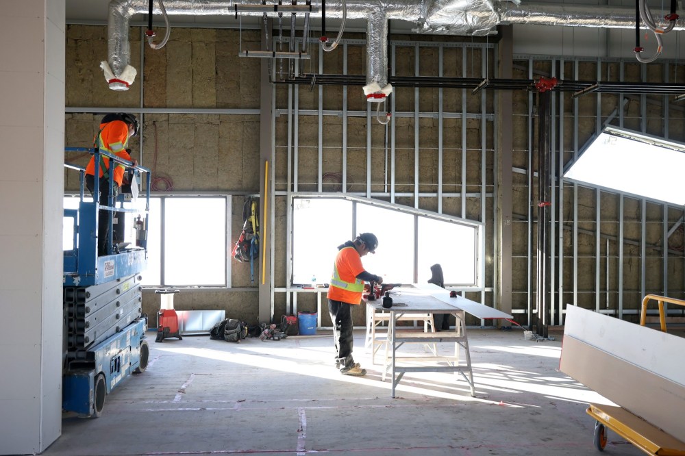Workers continue work on the Manitoba First Nations Police Service headquarters that will be a part of the under-construction Waywayseecappo Centre along Highway 10 just north of Brandon on Monday. (Tim Smith/The Brandon Sun)