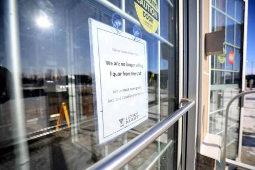 On Monday, Liquor Marts were displaying signs on front doors and shelves stating: “We are no longer selling liquor from the USA. Ask us about some great local and Canadian alternatives. (Ruth Bonneville/Winnipeg Free Press)