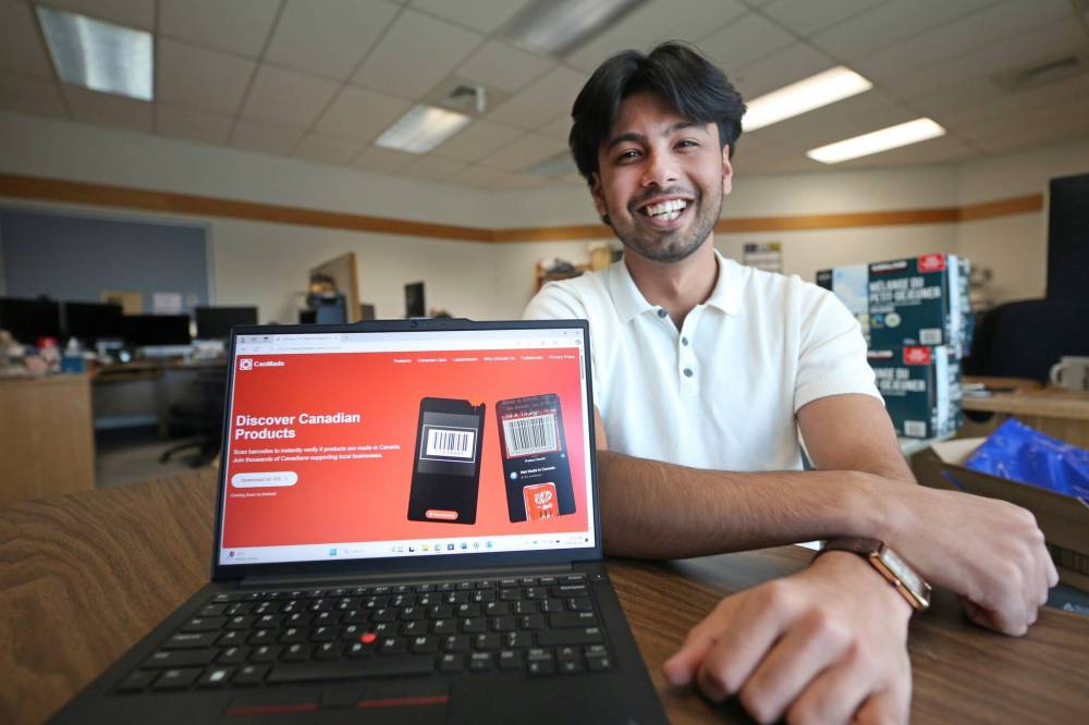 Hashim Farooq, an enterprise systems co-ordinator at Brandon University, shows his website advertising a new app that he designed called CanMade that helps shoppers learn whether products are made in Canada or not. The app works by reading the bar code of an item through a scan, which then brings up information on a smartphone. (Matt Goerzen/The Brandon Sun)