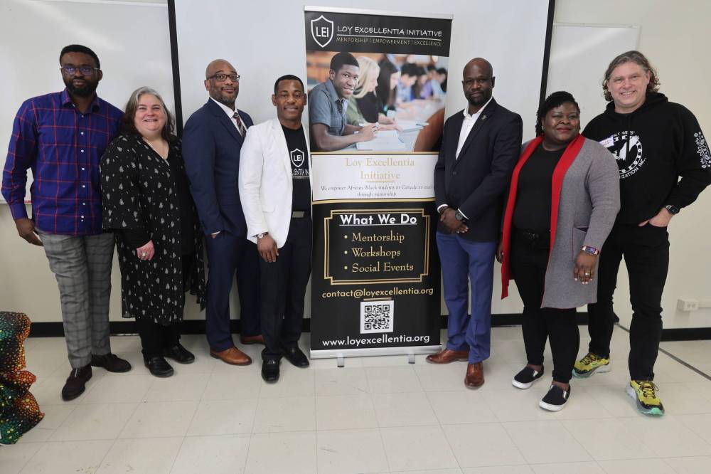 Left to Right: Abramson Taxi founder Bankole Abejide, Brandon University faculty of education dean Alysha Farrel, provost Kofi Campbell, Loy Excellentia founder Aloy Anyichie, first Brandon black councillor Sunday Frengi, Onyinye Ijeomah, and Brandon Mayor Jeff Fawcett pose for a picture during the Black History Month celebration Saturday afternoon.