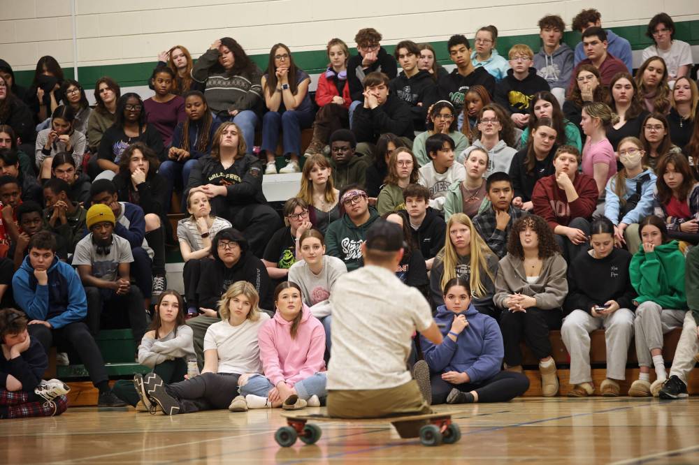 Motivational speaker Chris Koch talks to students and staff at École Secondaire Neelin High School in Brandon on Monday afternoon. (Tim Smith/The Brandon Sun)