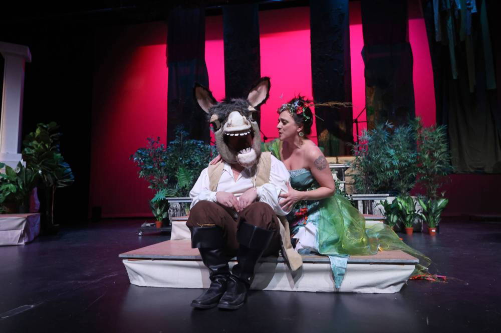 Mecca Productions actors Eric Fjeldsted as Nick Bottom (left) and Michelle Boudreau as Queen Titania rehearse a scene from William Shakespeare's “